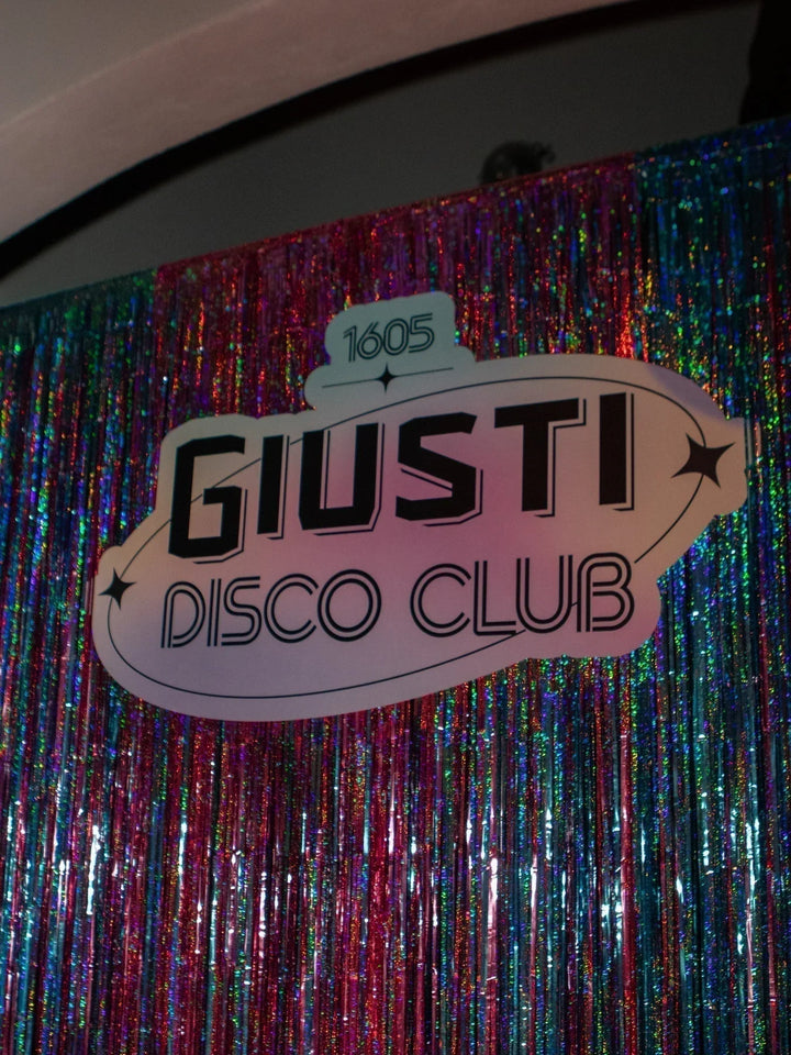 Follow the Call of the Disco Ball: The Giusti Christmas Party